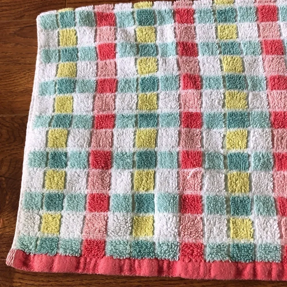 pink and green striped hand towel